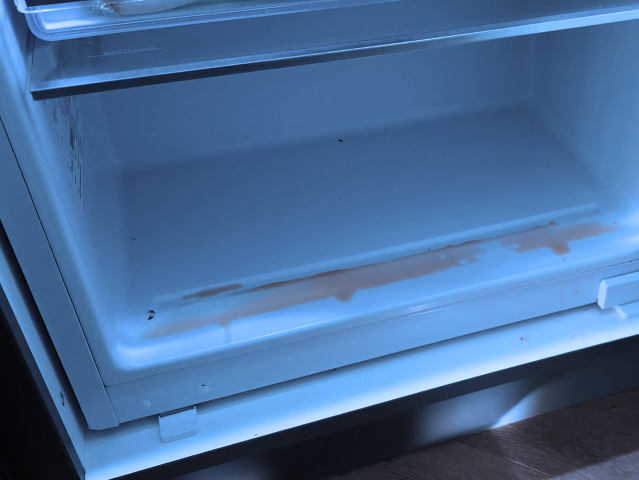 Koelkast condensafvoer reinigen